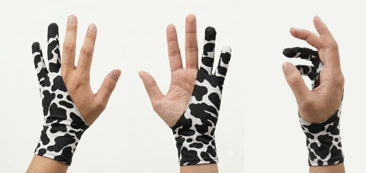 Artse Gloves double-sided black and white patterned drawing gloves shown on hands
