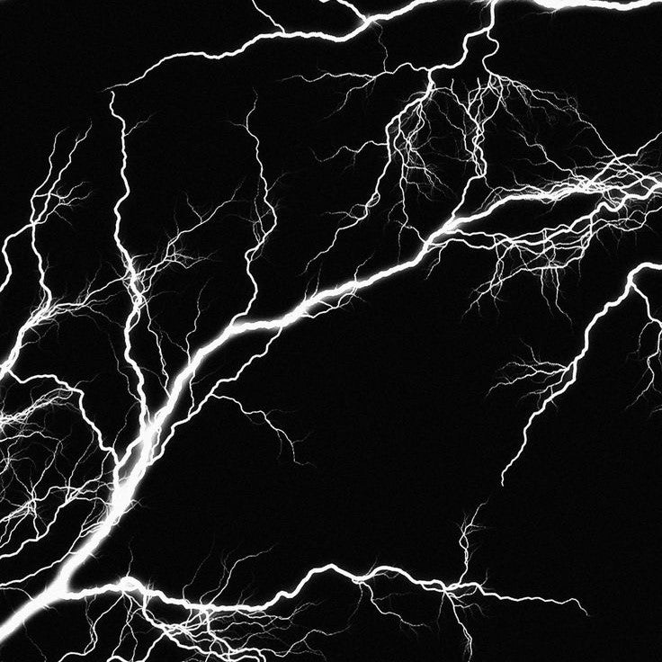 White lightning bolts on a black background